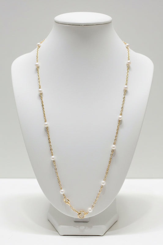 Dona Gold Pearl Necklace with a delicate gold-tone chain and evenly spaced small white beads. Available in 16-inch, 18-inch, and 20-inch lengths.