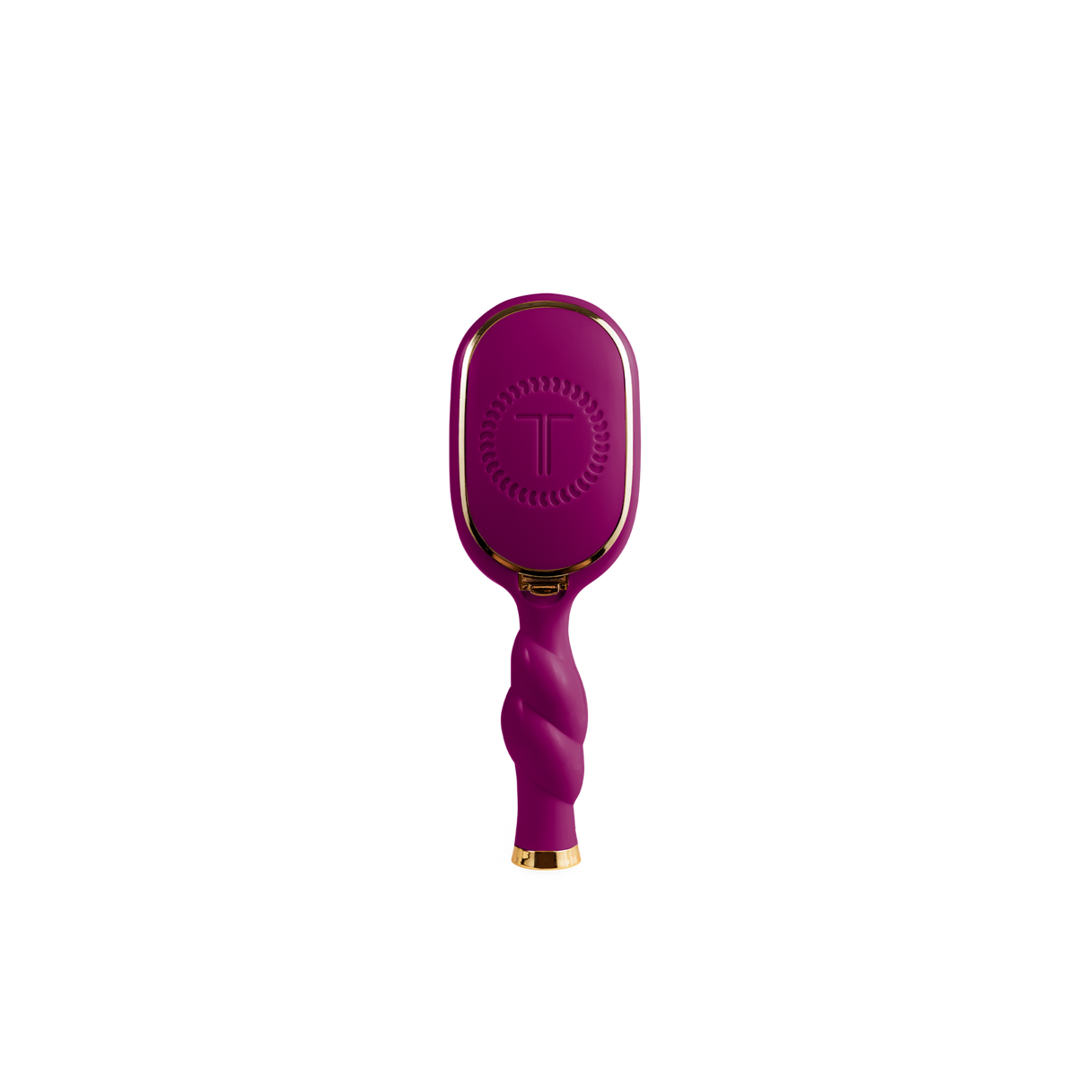Mini Boar Bristle Hair Brush in Mulberry with twisted handle, gold accents, and “T” logo on back. Available in mini size.