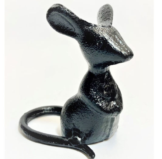 This product is a 3x3.5x2.5" black mouse figurine crafted from robust cast iron. The mouse is presented in a sitting posture with notable features including prominent ears, a sleek body, and a long curving tail. Finished with gloss and boasting subtle surface textures for added depth and detail.