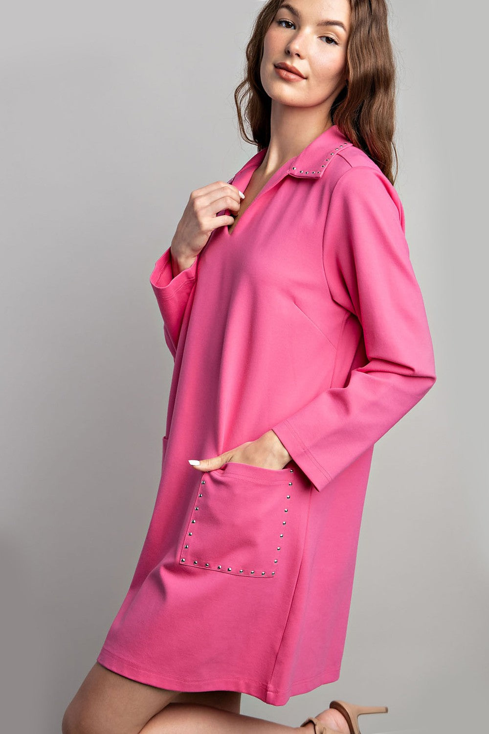 Jewel Detail Pocket Mini Dress with long sleeves, collared neckline, jeweled front pocket. Available in sizes XS-XL.