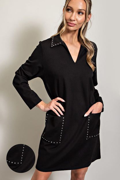 Black long sleeve mini dress with collared neckline, jewel accents on collar, shoulders, and pockets. Sizes: XS-L.
