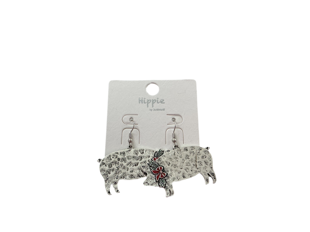 Silver pig-shaped Christmas earrings with red flower detail. Available in small and medium sizes. Labeled "Hippie.