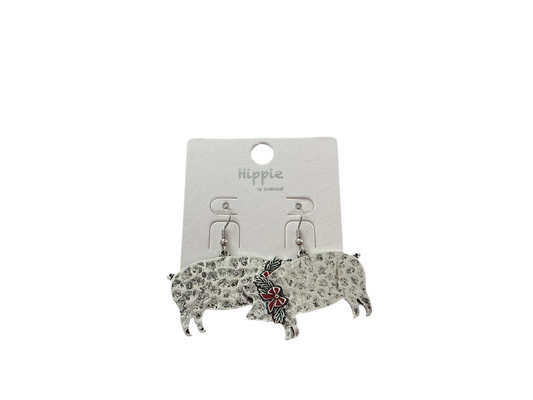 Silver pig-shaped Christmas earrings with red flower detail. Available in small and medium sizes. Labeled "Hippie.