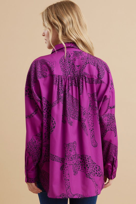 Magenta Satin Animal Print Top with loose long dolman sleeves. Available in sizes XS–XL.