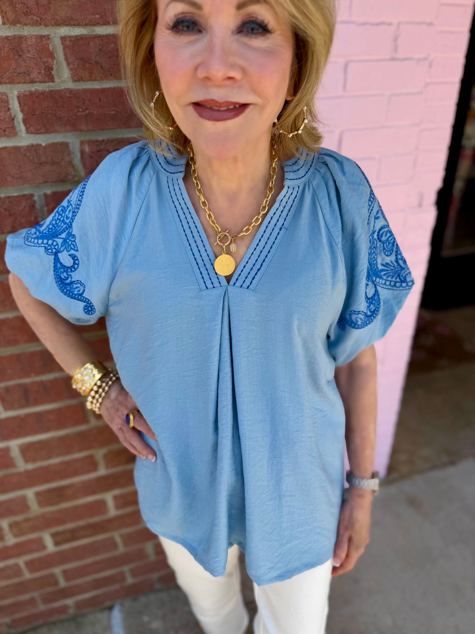 Light Blue Embroidered Puff Sleeve Top, available in sizes XS-XL.