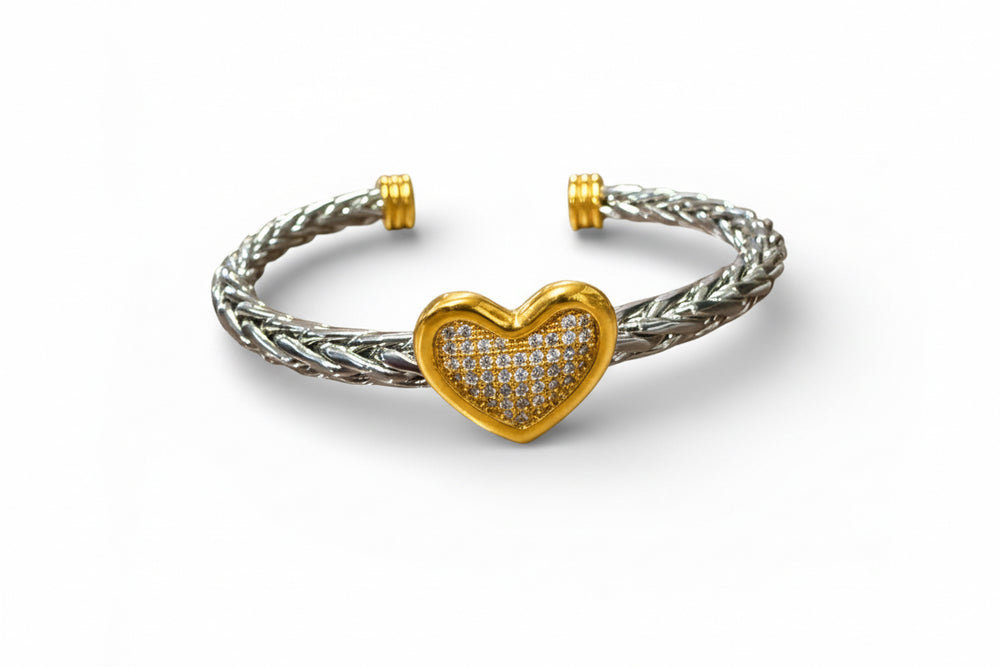 Twisted Silver Heart Bangle: silver braided cuff, gold accents, diamond-studded gold heart. Available in S, M, L.