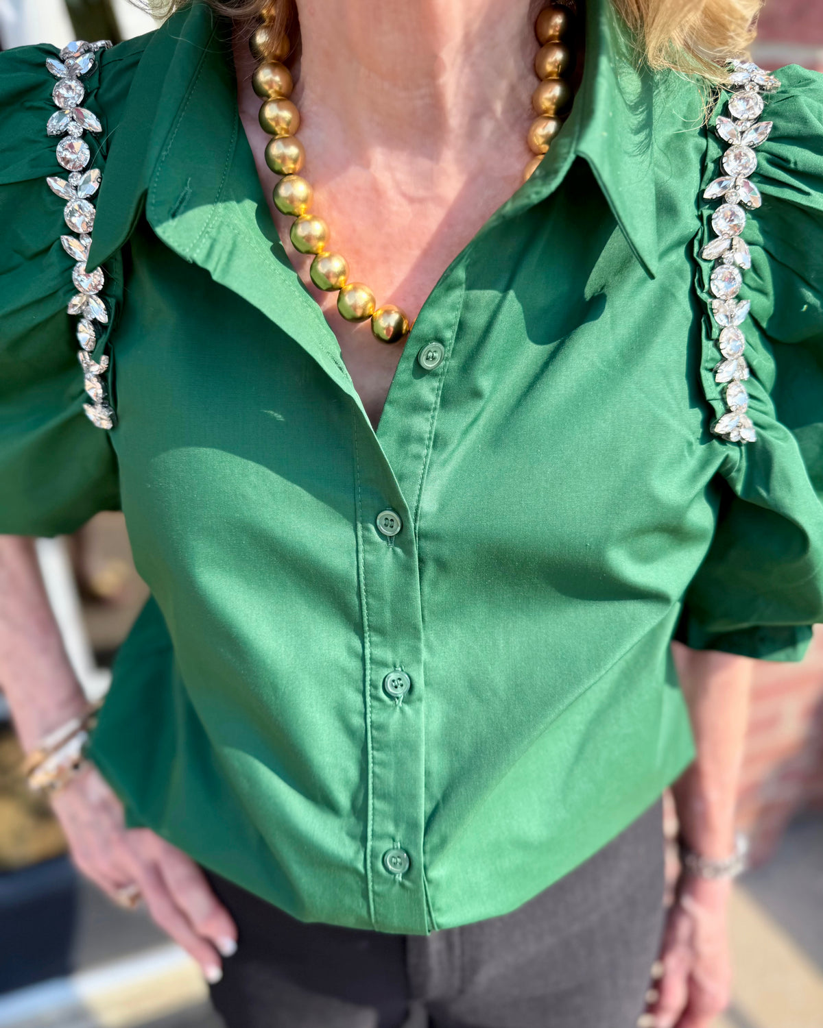 Hadley Blouse in hunter green with puff sleeves; available in sizes XS–XL.