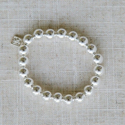 Shiny Silver Bracelet with hypoallergenic silver beads and small square charm. Available sizes: S, M, L.