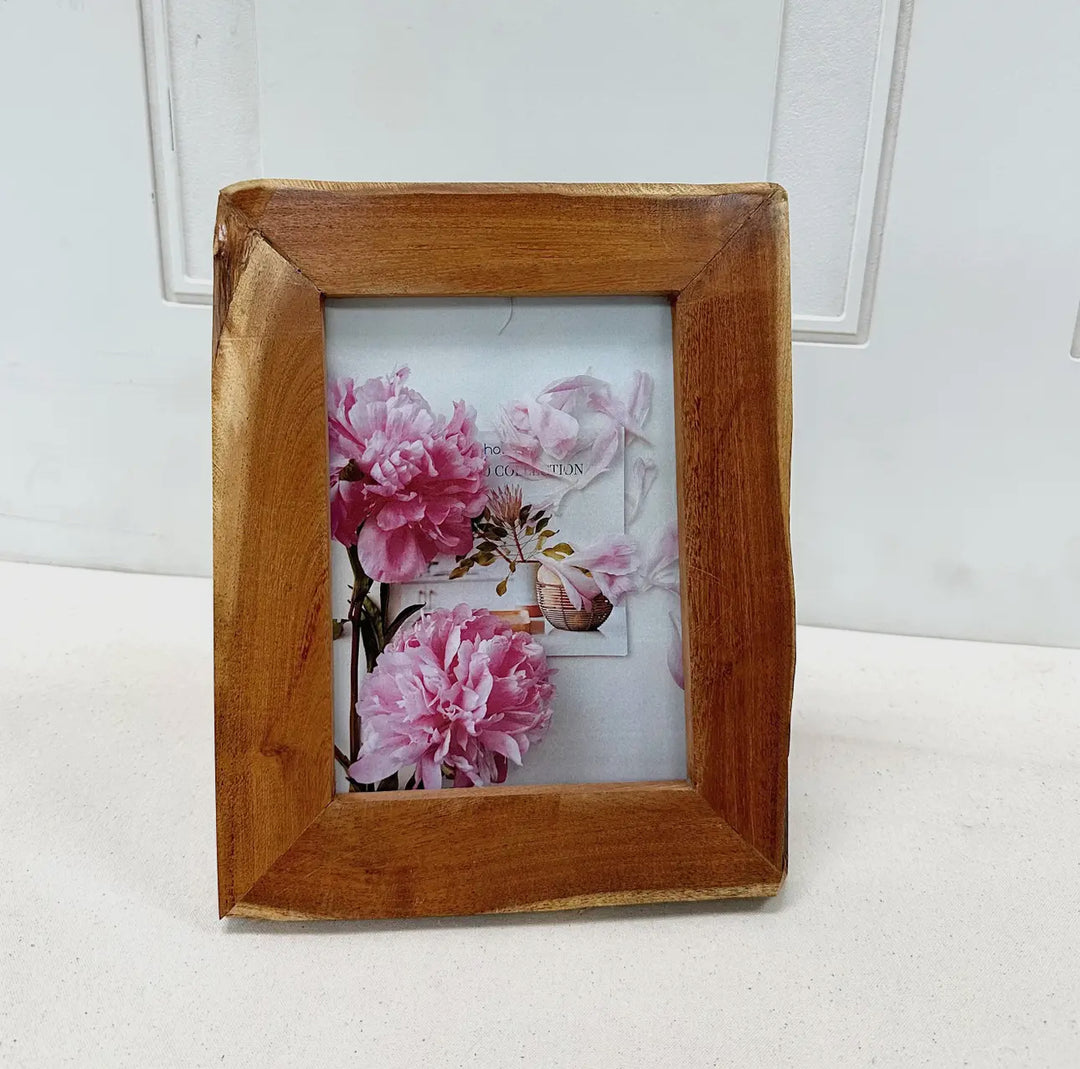 Ecoframe Wood Photo Holder, available in 4x6 and 5x7 sizes, features a simple wood design for displaying photos.