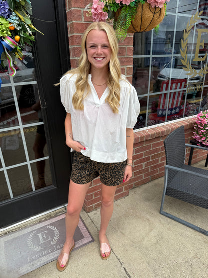 Ruffled V-Neck Puff Sleeve Blouse available in sizes XS-XL.
