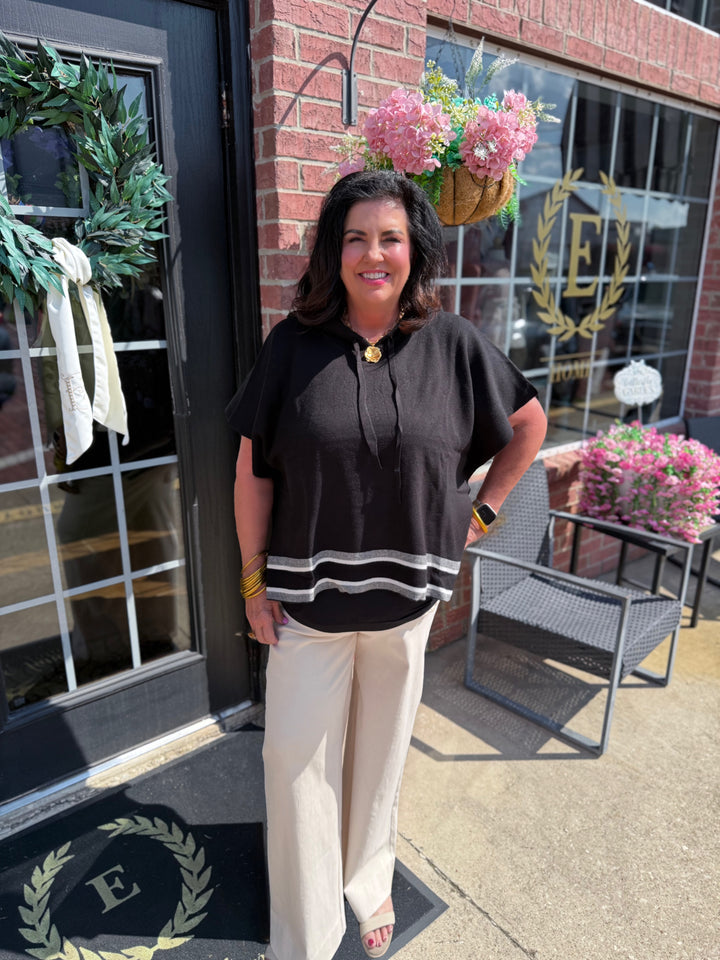 Aspen Stripe Hoodie Poncho: black with white stripes, cozy fit. Sizes available: XS-XL.