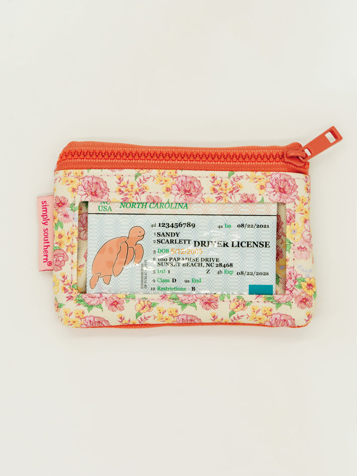 Compact key chain wallet with zippered pockets, clear ID window, pink zipper, keyring, Simply Southern tag. Sizes: not specified.