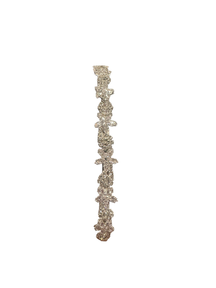 Crystal headband with multiple sparkling stones. Available sizes: small, medium, and large.
