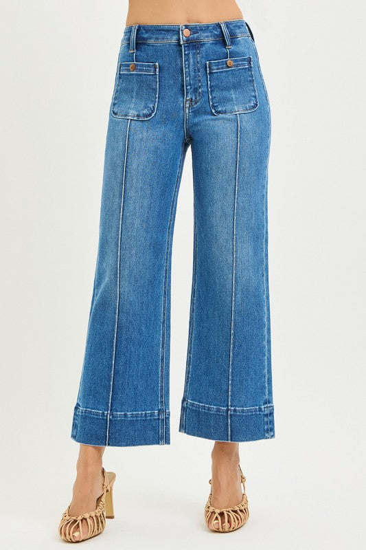 Risen High Rise Crop Wide Pintuck Jeans with front patch pockets, available in sizes 24-32.