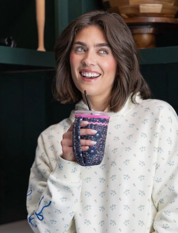 Navy Blue Flower Insulated Drink Holder, fits most standard cup sizes.