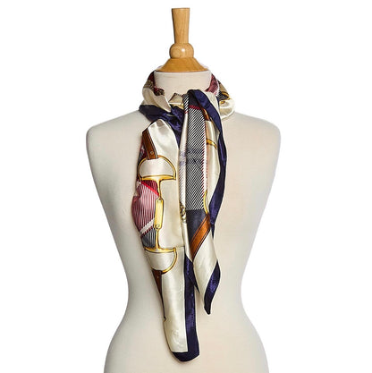 Tartan Silk Scarf in cream, navy, red, and gold plaid on shiny silk. Available sizes: S, M, L.