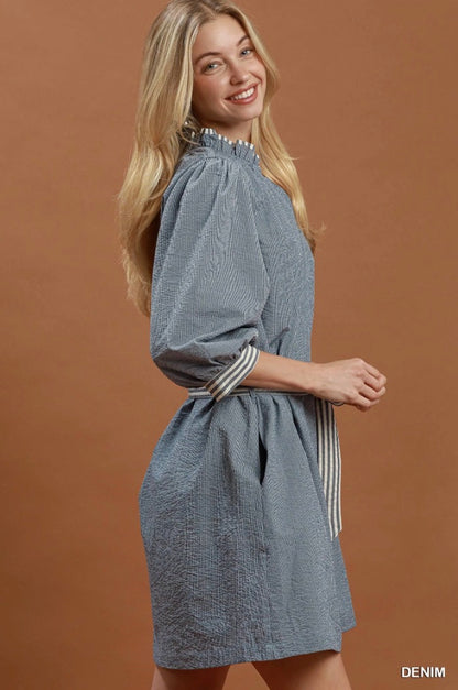 Contrast Tie Waist Mini Dress with blue and white striped contrast details, A-line silhouette, and puffed sleeves. Available in sizes XS-XL.