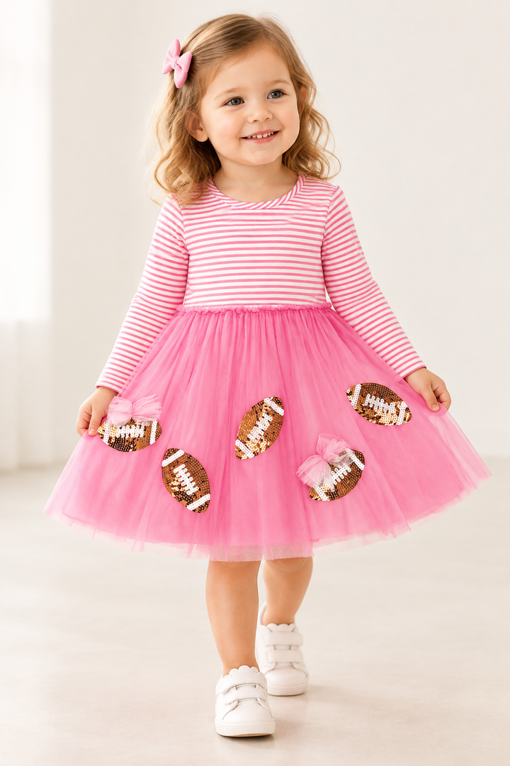Sequin Football Tutu Dress: pink striped sports-inspired dress decorated with sequin footballs. Available in sizes 2T-6X.