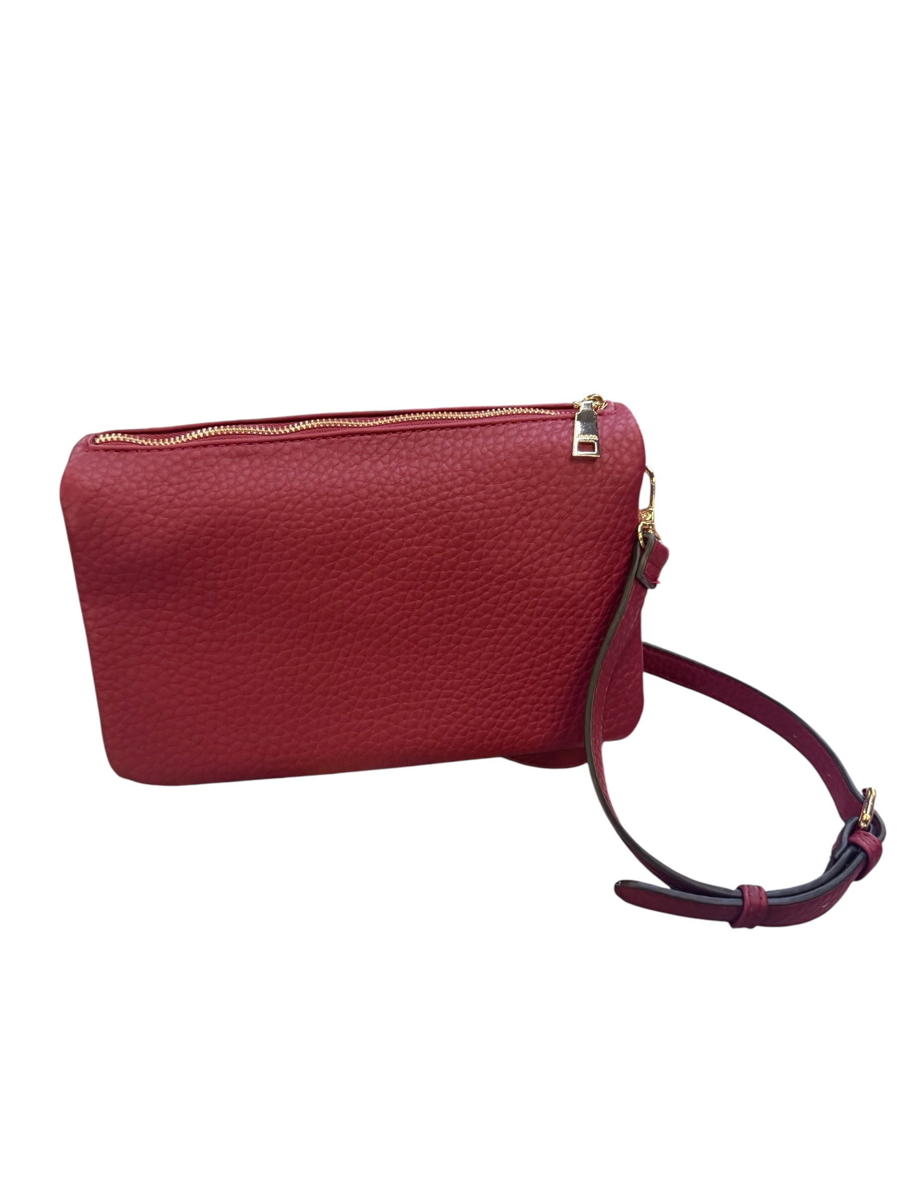 Phiona Studded Flapover Crossbody in textured red leather with gold zipper, adjustable strap, available in small and medium sizes.