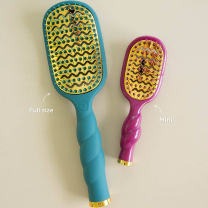 Teal full-size hairbrush and mulberry mini vented hair brush, both with gold bristles and wavy handles; sizes available: full size and mini.