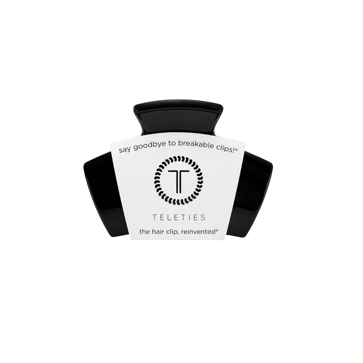 Jet Black Petite Claw Clip from TELETIES with a white label stating “say goodbye to breakable clips! TELETIES the hair clip, reinvented.” No-slip design for secure, comfortable all-day wear. Available sizes: Petite.