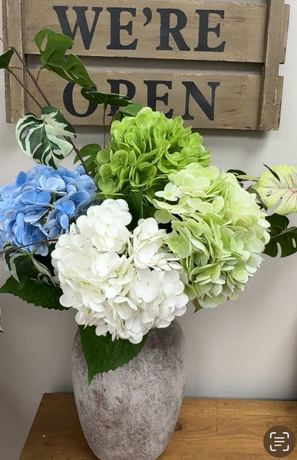 18" light green Real Touch Hydrangea with lifelike stems and green leaves. Available in 18" size.