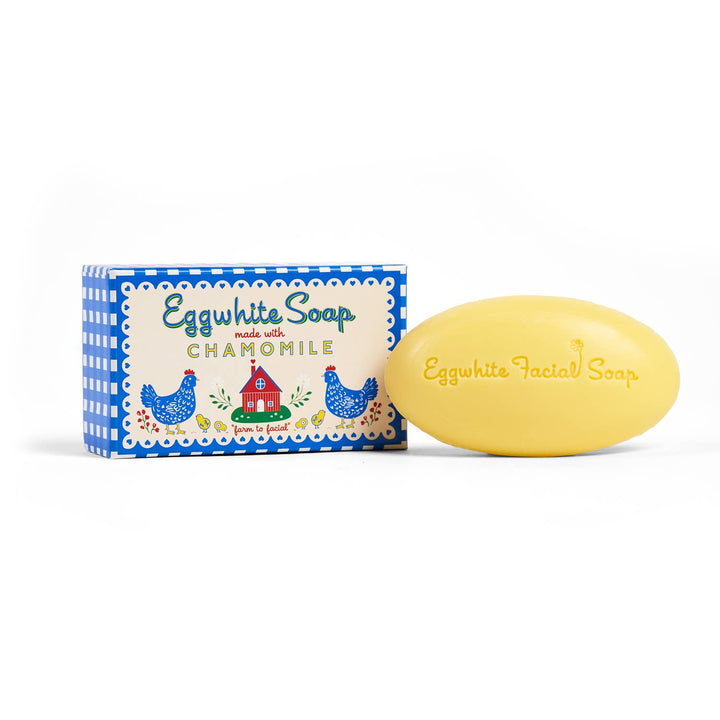 Yellow oval bar labeled "Eggwhite &amp; Chamomile Facial Soap." Available in multiple sizes for pore tightening and glowing skin.
