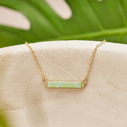 Gold chain necklace with handcrafted rectangular pendant in light green and white. Sizes: 16", 18", 20".