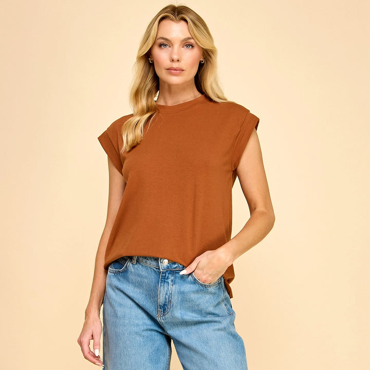 Rust-colored The Basic Babe Top, sleeveless crew neck with folded shoulder details. Available in all sizes.