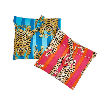 Chic gift bags with a tiger design, featuring blue/orange and red/orange stripes. Wrap closure with top knot. Sizes available: Medium and Large.