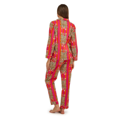 Eye of the Tiger Cotton Printed Pajamas feature a bold stripe and tiger motif in vibrant pink. Sizes available: S, M, L, XL.