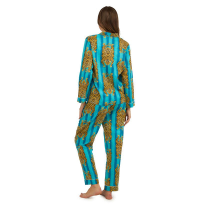 Eye of the Tiger Cotton Printed Pajamas feature a bold stripe and tiger motif in blue. The set includes a long-sleeved top and full-length pants. Available in sizes S, M, L, XL.