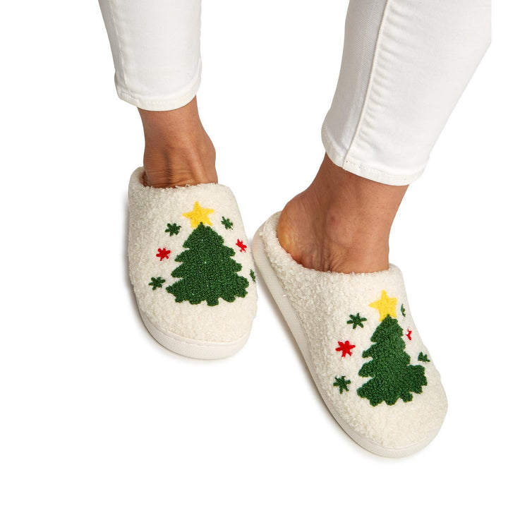Off-white plush Christmas tree slippers with a yellow star and red and green snowflake patterns. Available in multiple sizes.