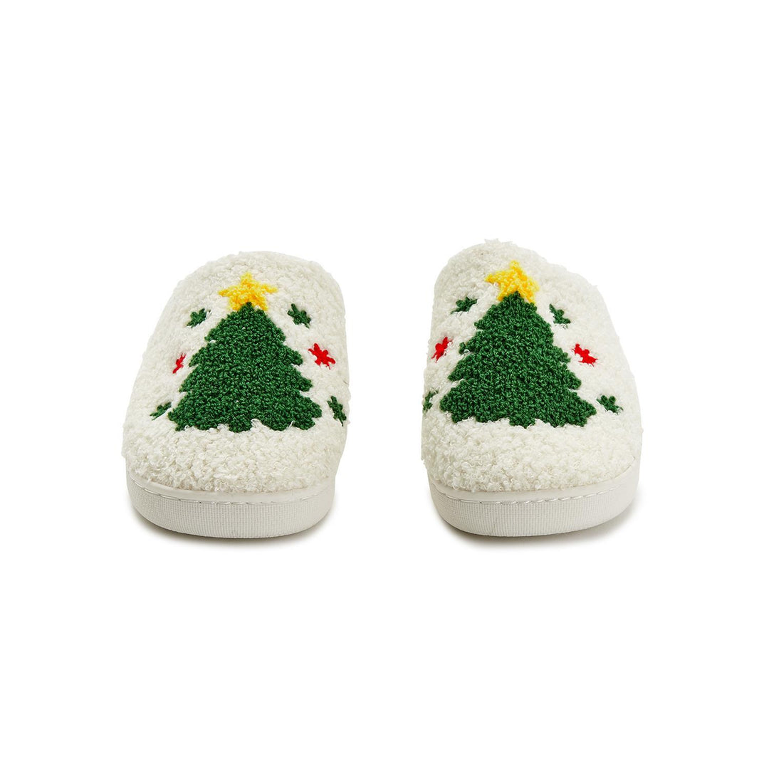 White plush Tree Icon Slipper with green Christmas tree, yellow star, and red and green accents.