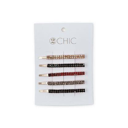 Five rhinestone hair pins in pink, gold, red, green, and black on a white card. Sizes available: small, medium.