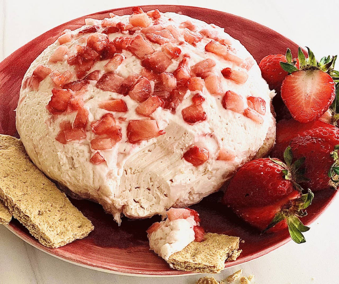 Strawberries N Cream Cheesecake Dip—creamy, all-natural dip with chopped strawberries topping. Available in 8oz or 16oz sizes.