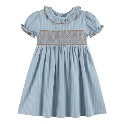 Light blue short-sleeved dress with vertical white pinstripes, smocked chest, ruffled collar, and brown trim on the collar and puffed sleeves. Size available: 12-18M.