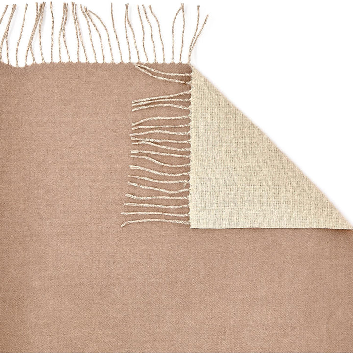 Beige reversible woven scarf with one fringed edge, lighter underside, soft cashmere feel. Available in multiple sizes.