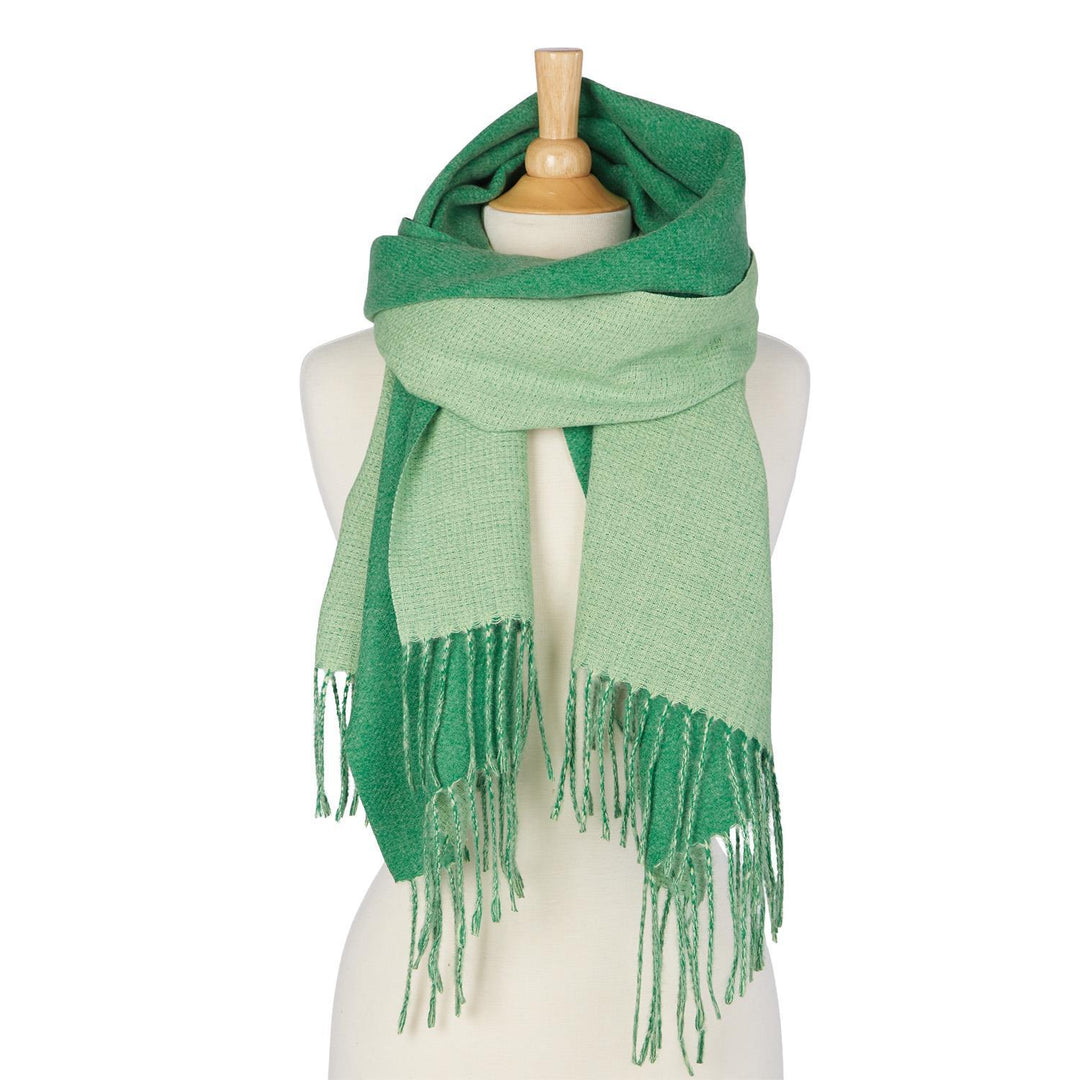 Reversible Scarf in two-tone green with fringed ends; light and dark sides. Available in one size.