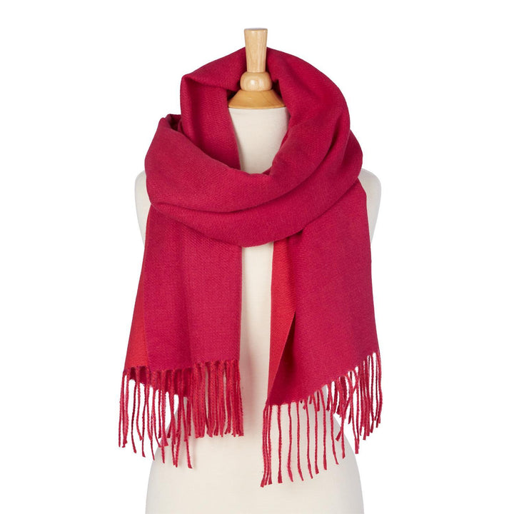 Reversible Scarf in large, bright pink with fringed ends; available sizes: large.