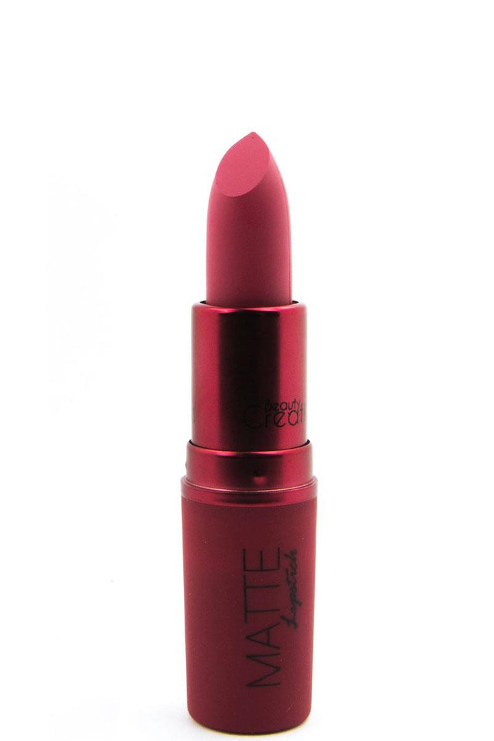 Essential Matte Lipstick in deep red. Provides long-lasting color. Available sizes: 4g, 2g (mini).
