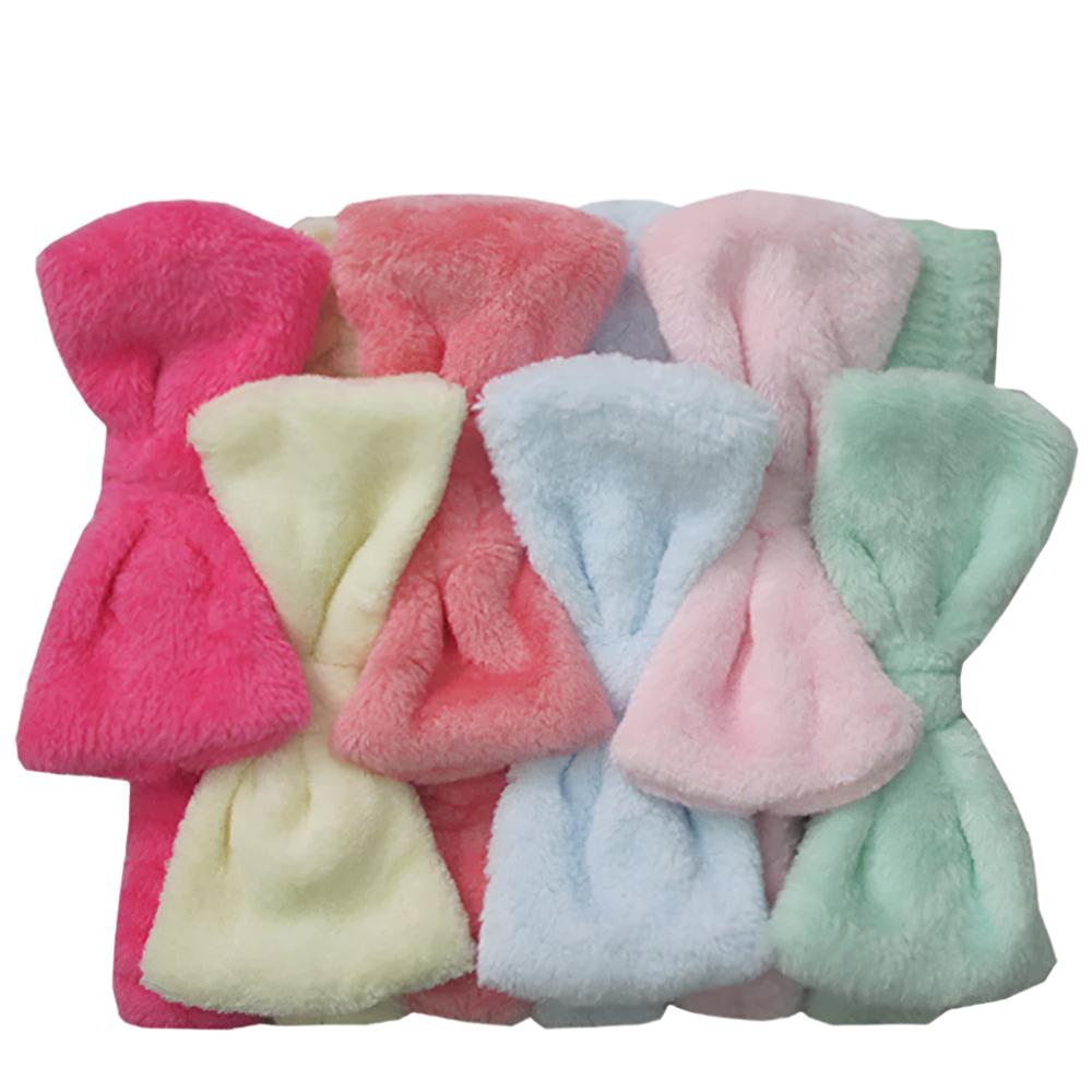 Set of seven Cozy Spa Bow Headbands with charming bows in pastel shades: pink, red, yellow, blue, and green.