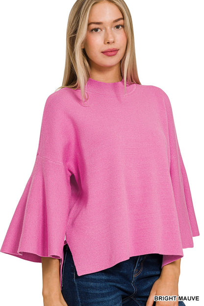 Viscose Bell Sleeve Sweater available in sizes XS, S, M, L, XL. It features a vibrant pink color and bell sleeves.