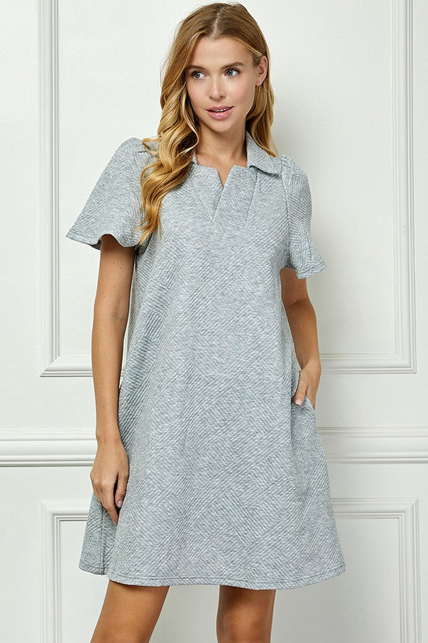 Emilie Collared Textured Dress: light gray, knee-length, short-sleeve, chevron pattern. Available in sizes XS–XL.