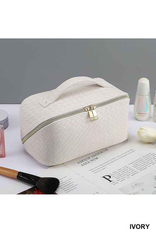 Ivory Woven Vegan Leather Flat-Lay Makeup Bag with textured pattern, top handle, and zipper. Available in standard size.