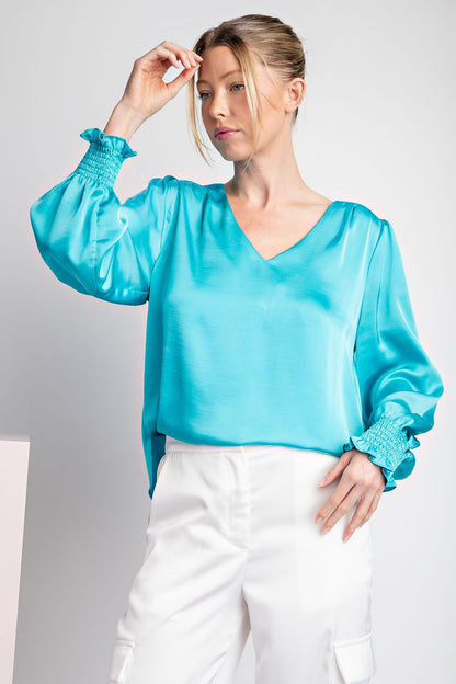 Aqua Satin V-Neck Bubble Sleeve Blouse with smocked cuffs. Available in sizes XS-XL.