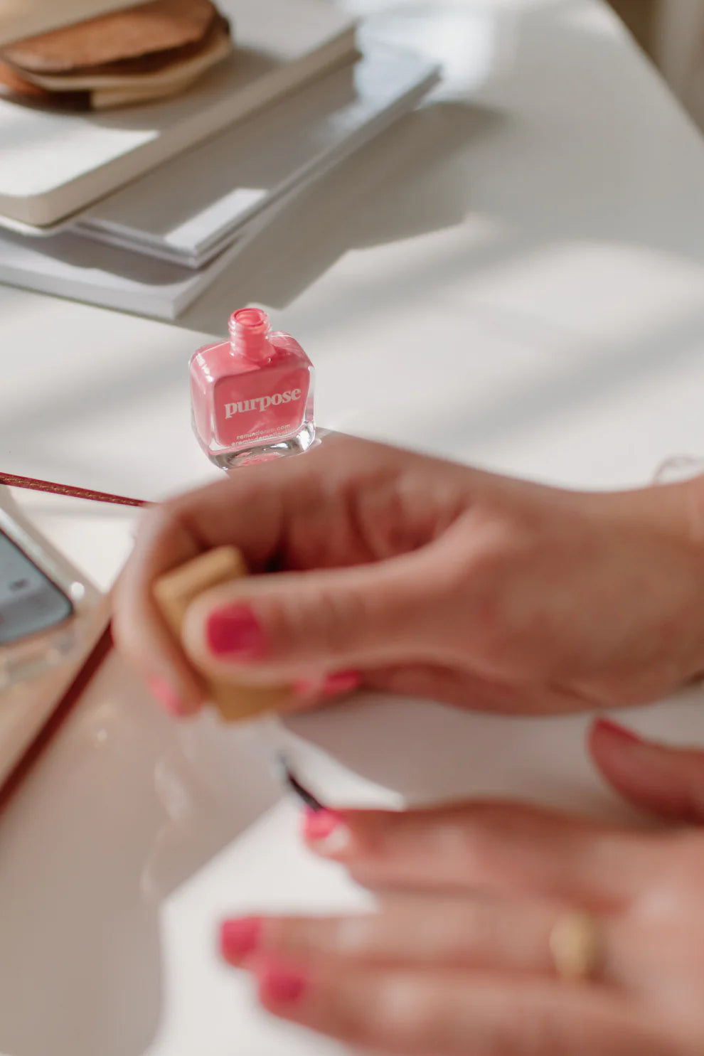 ‘Purpose’ honeysuckle pink vegan, cruelty-free reminder nail polish bottle shown; available in 10ml and 15ml sizes.