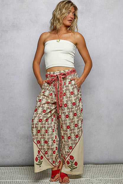 Straight Fit Waist Belt Floral Pattern Pants; available in sizes XS–XL.