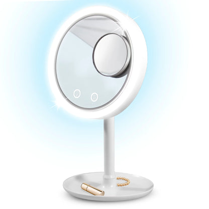 Round illuminated LED mirror with fan and smaller magnifying mirror attached. Main mirror emits soft white light. Mounted on white stand with circular base. Ideal for travel or touch-ups.

**Sizes Available:**   
- Diameter: 15 cm / 5.9 inches  
- Height: 20 cm / 7.8 inches  