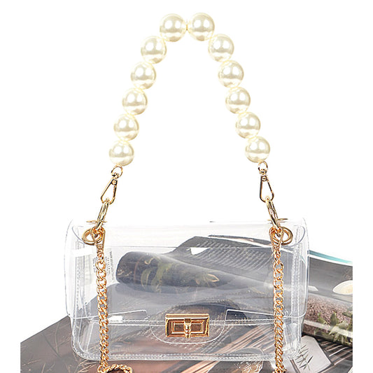 Clear Bag with Pearl Handle and Gold Chain Crossbody Strap. Sizes available: One Size.